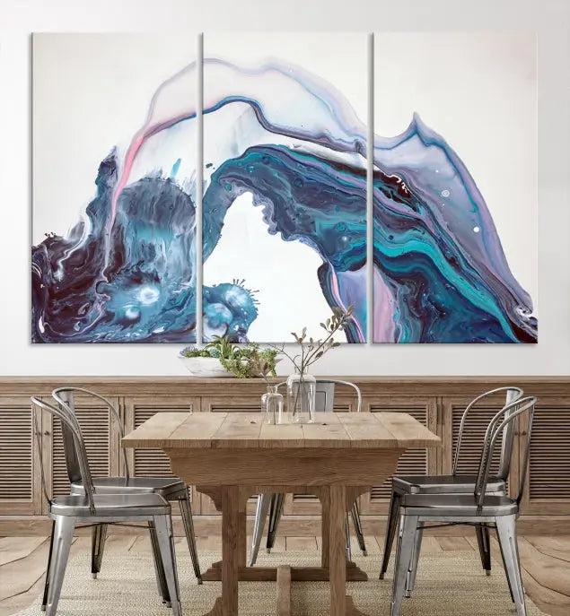 A stunning triptych of the "Colorful Marble Fluid Effect Wall Art Abstract Canvas Wall Art Print" in blue and purple hues hangs prominently in this modern living room.