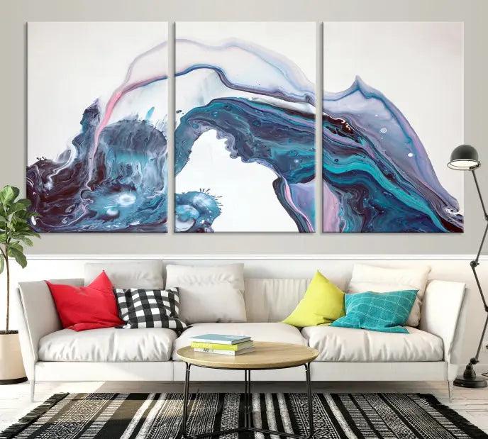 A stunning triptych of the "Colorful Marble Fluid Effect Wall Art Abstract Canvas Wall Art Print" in blue and purple hues hangs prominently in this modern living room.