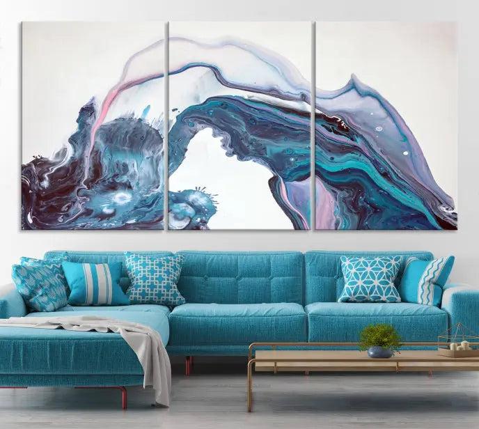 A stunning triptych of the "Colorful Marble Fluid Effect Wall Art Abstract Canvas Wall Art Print" in blue and purple hues hangs prominently in this modern living room.