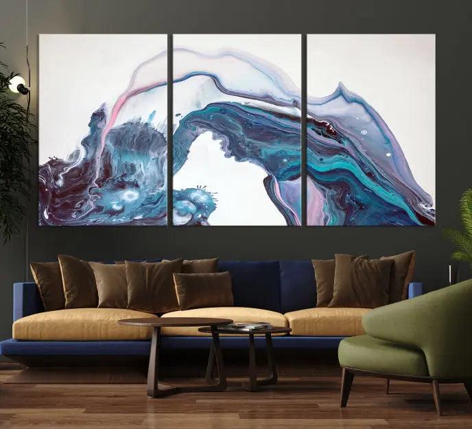 A stunning triptych of the "Colorful Marble Fluid Effect Wall Art Abstract Canvas Wall Art Print" in blue and purple hues hangs prominently in this modern living room.