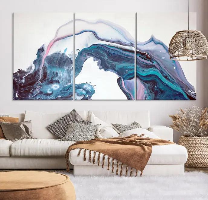 A stunning triptych of the "Colorful Marble Fluid Effect Wall Art Abstract Canvas Wall Art Print" in blue and purple hues hangs prominently in this modern living room.