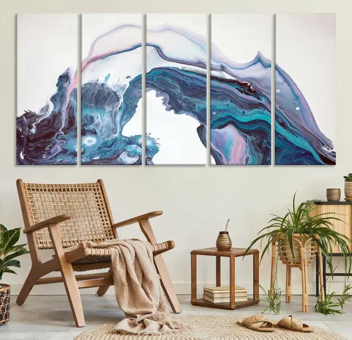 A stunning triptych of the "Colorful Marble Fluid Effect Wall Art Abstract Canvas Wall Art Print" in blue and purple hues hangs prominently in this modern living room.