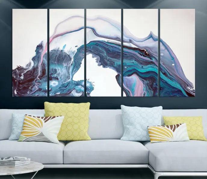 A stunning triptych of the "Colorful Marble Fluid Effect Wall Art Abstract Canvas Wall Art Print" in blue and purple hues hangs prominently in this modern living room.