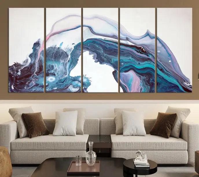 A stunning triptych of the "Colorful Marble Fluid Effect Wall Art Abstract Canvas Wall Art Print" in blue and purple hues hangs prominently in this modern living room.