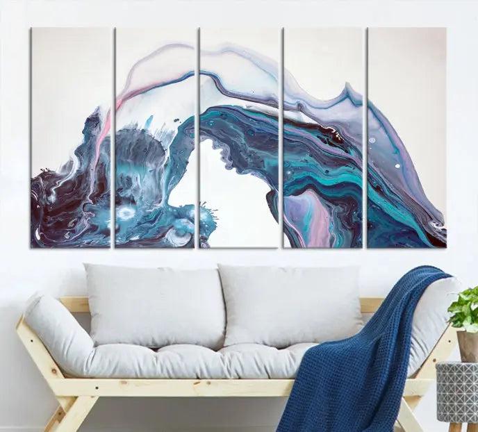 A stunning triptych of the "Colorful Marble Fluid Effect Wall Art Abstract Canvas Wall Art Print" in blue and purple hues hangs prominently in this modern living room.