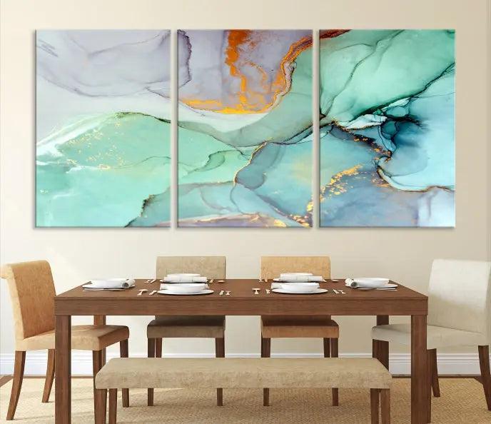 Contemporary living room featuring the Colorful Marble Fluid Effect Wall Art Abstract Canvas Wall Art Print, showcasing multi-panel abstract designs in teal, gold, and white tones. This museum-quality canvas artwork is ready to hang and finished with a UV-protective coating for enduring vibrancy.