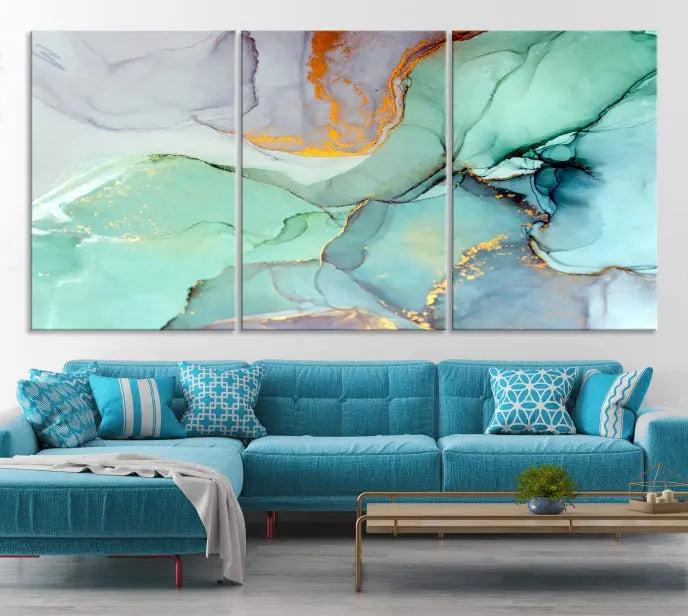 Contemporary living room featuring the Colorful Marble Fluid Effect Wall Art Abstract Canvas Wall Art Print, showcasing multi-panel abstract designs in teal, gold, and white tones. This museum-quality canvas artwork is ready to hang and finished with a UV-protective coating for enduring vibrancy.