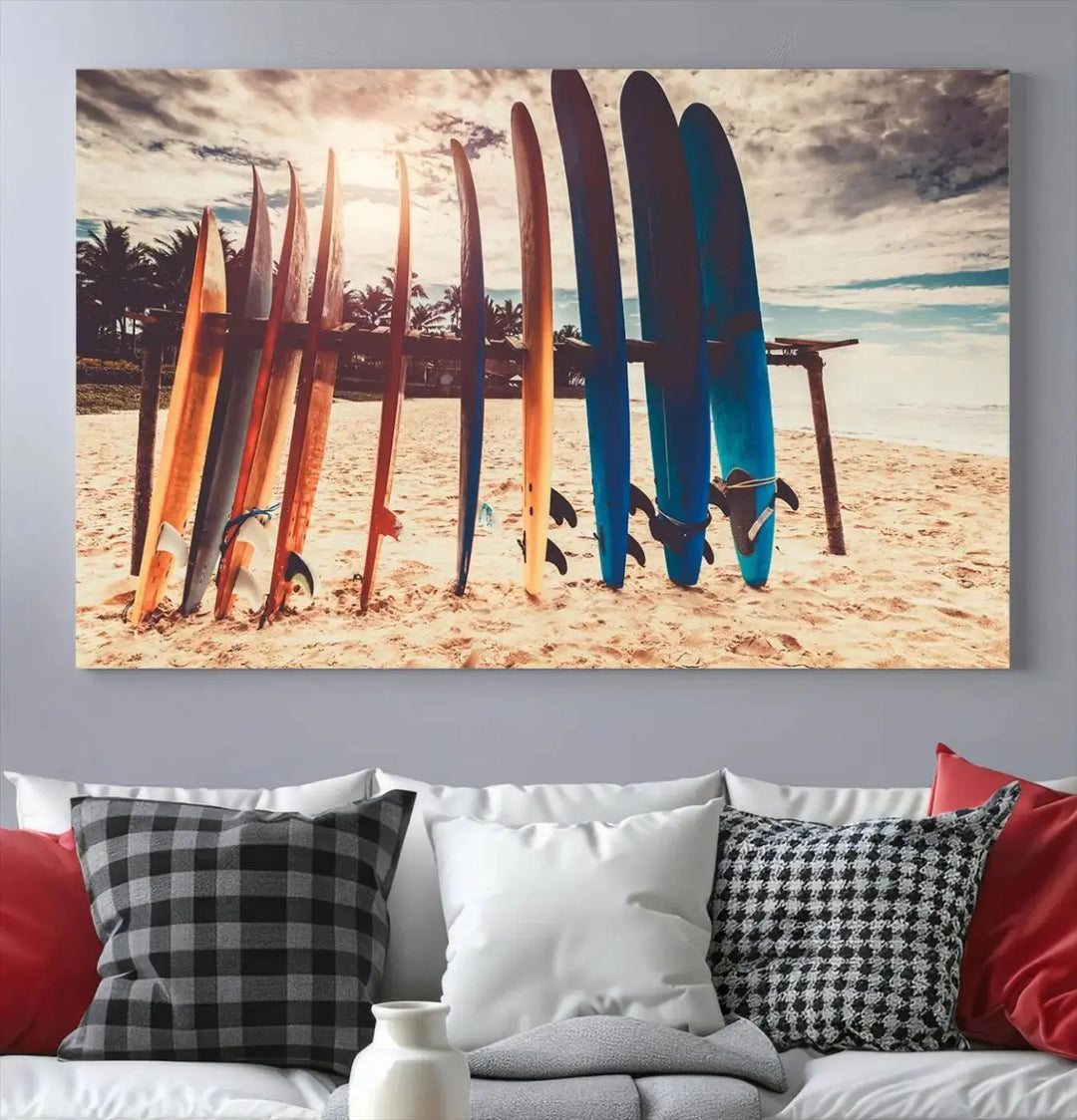 A three-panel canvas wall art titled "Colorful Surfing Boards and Sunset Canvas Wall Art Print Canvas Print" features surfboards on a sandy beach. This piece is crafted on gallery-wrapped, museum-quality canvas with a UV-protective coating.