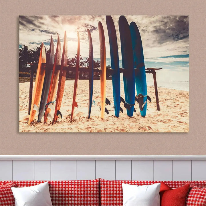 A three-panel canvas wall art titled "Colorful Surfing Boards and Sunset Canvas Wall Art Print Canvas Print" features surfboards on a sandy beach. This piece is crafted on gallery-wrapped, museum-quality canvas with a UV-protective coating.