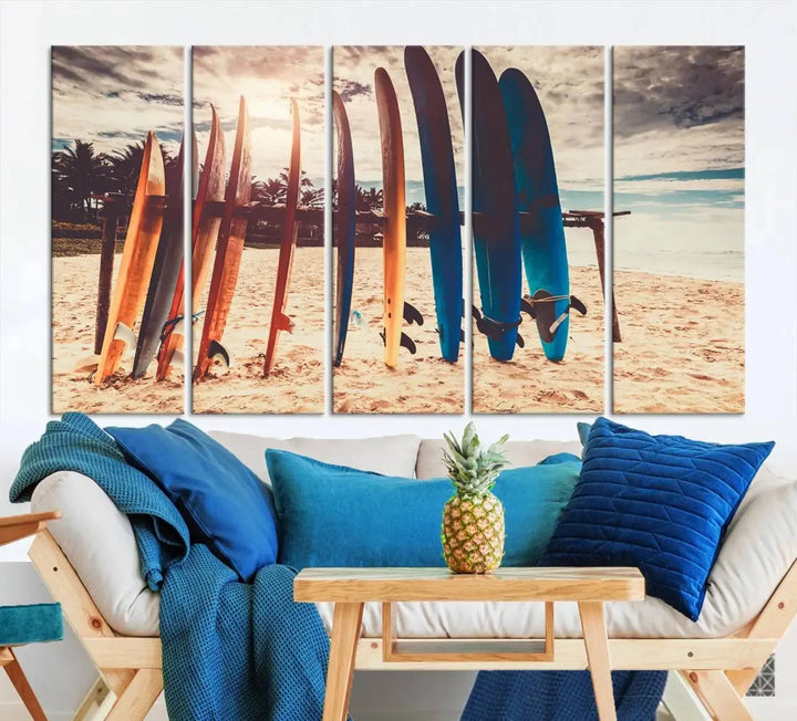 A three-panel canvas wall art titled "Colorful Surfing Boards and Sunset Canvas Wall Art Print Canvas Print" features surfboards on a sandy beach. This piece is crafted on gallery-wrapped, museum-quality canvas with a UV-protective coating.