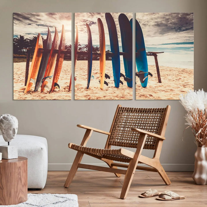 A three-panel canvas wall art titled "Colorful Surfing Boards and Sunset Canvas Wall Art Print Canvas Print" features surfboards on a sandy beach. This piece is crafted on gallery-wrapped, museum-quality canvas with a UV-protective coating.