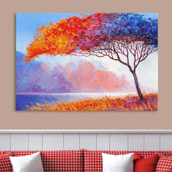 The Colorful Tree Wall Art Canvas is a vibrant, multi-panel painting depicting a colorful tree by a lake. It is crafted on museum-quality canvas and comes ready to hang.