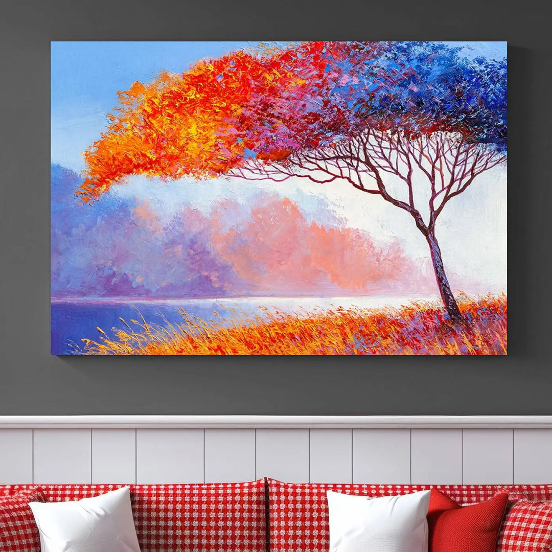 The Colorful Tree Wall Art Canvas is a vibrant, multi-panel painting depicting a colorful tree by a lake. It is crafted on museum-quality canvas and comes ready to hang.