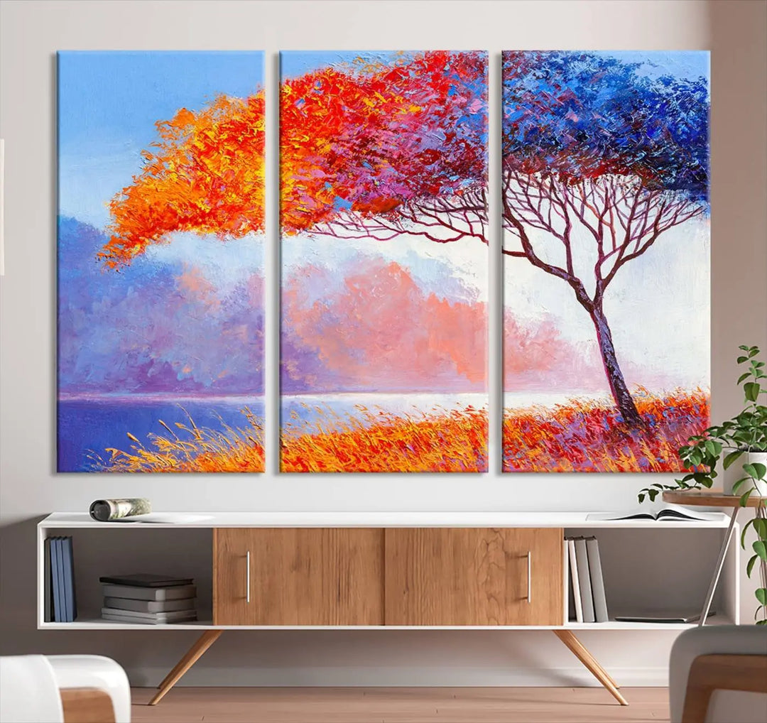 The Colorful Tree Wall Art Canvas is a vibrant, multi-panel painting depicting a colorful tree by a lake. It is crafted on museum-quality canvas and comes ready to hang.