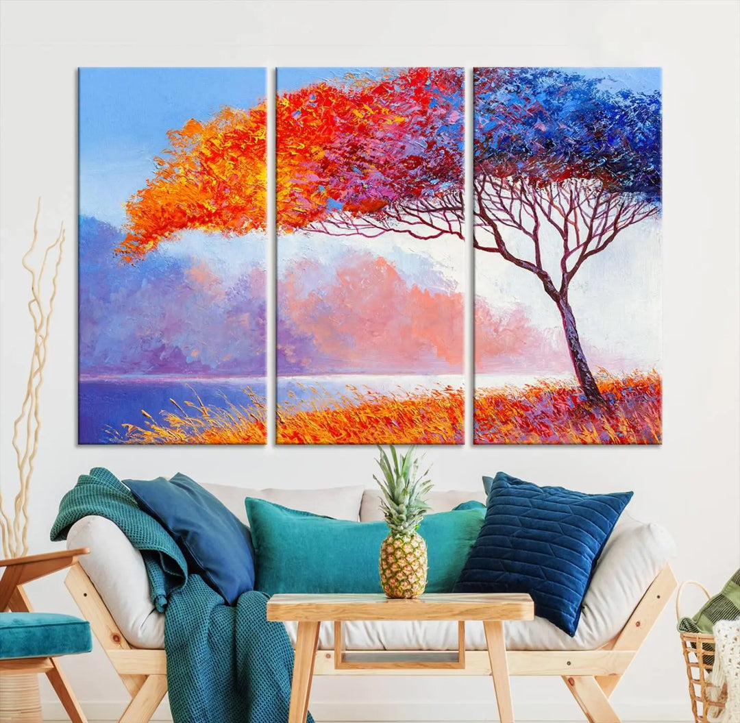 The Colorful Tree Wall Art Canvas is a vibrant, multi-panel painting depicting a colorful tree by a lake. It is crafted on museum-quality canvas and comes ready to hang.