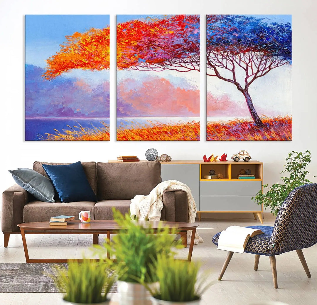 The Colorful Tree Wall Art Canvas is a vibrant, multi-panel painting depicting a colorful tree by a lake. It is crafted on museum-quality canvas and comes ready to hang.