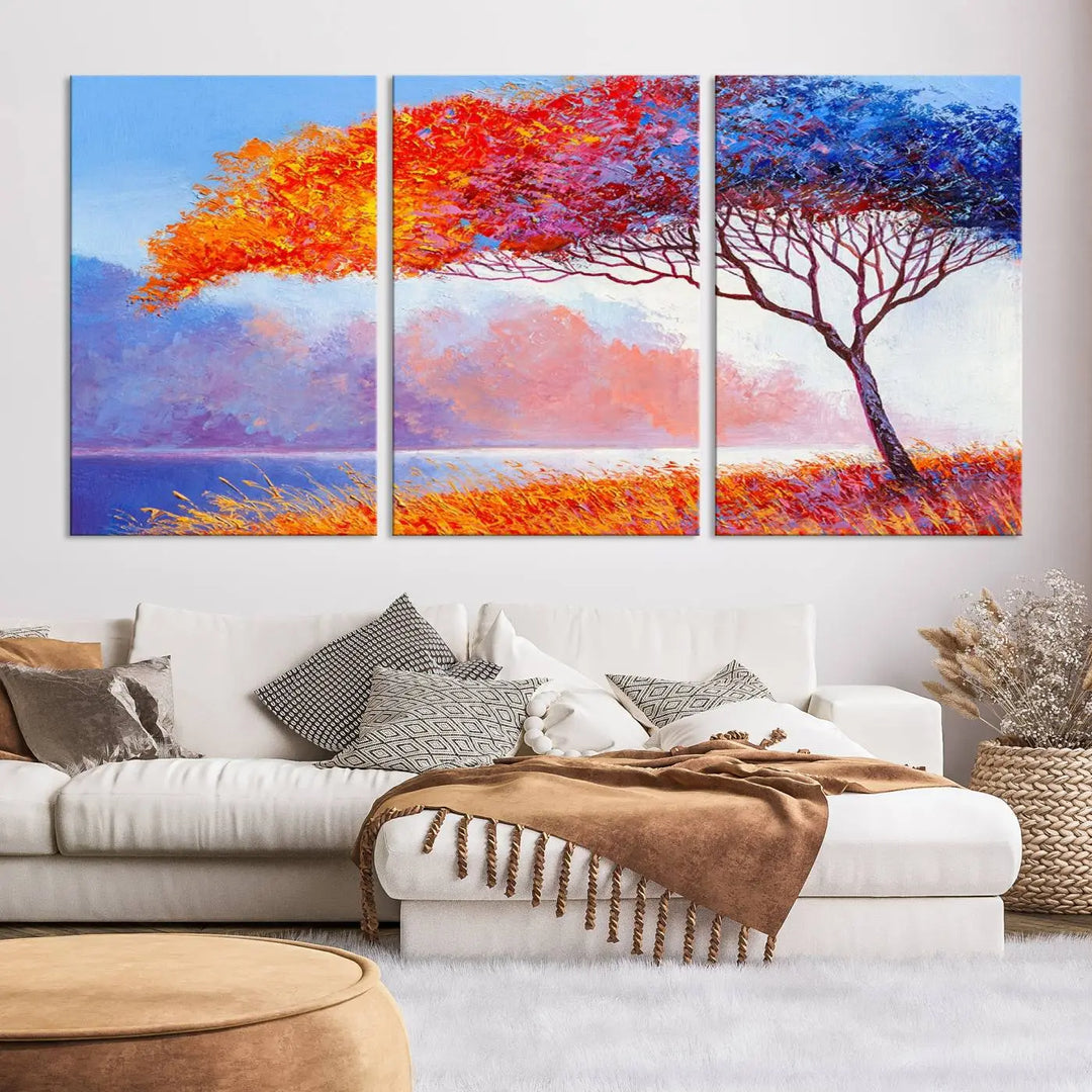 The Colorful Tree Wall Art Canvas is a vibrant, multi-panel painting depicting a colorful tree by a lake. It is crafted on museum-quality canvas and comes ready to hang.