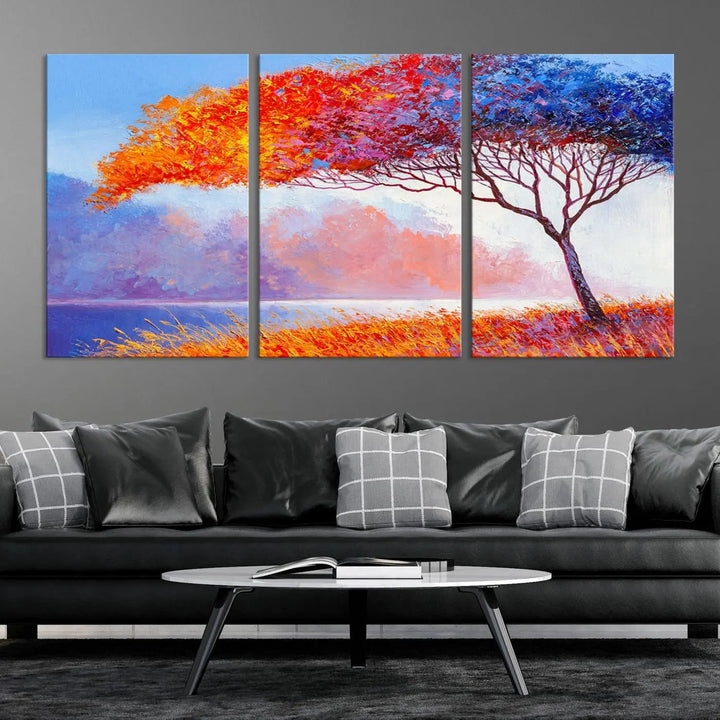 The Colorful Tree Wall Art Canvas is a vibrant, multi-panel painting depicting a colorful tree by a lake. It is crafted on museum-quality canvas and comes ready to hang.