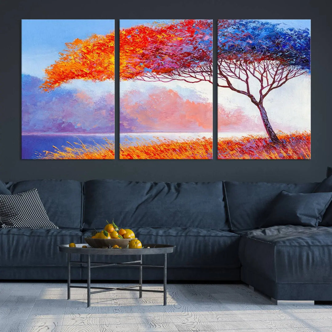 The Colorful Tree Wall Art Canvas is a vibrant, multi-panel painting depicting a colorful tree by a lake. It is crafted on museum-quality canvas and comes ready to hang.