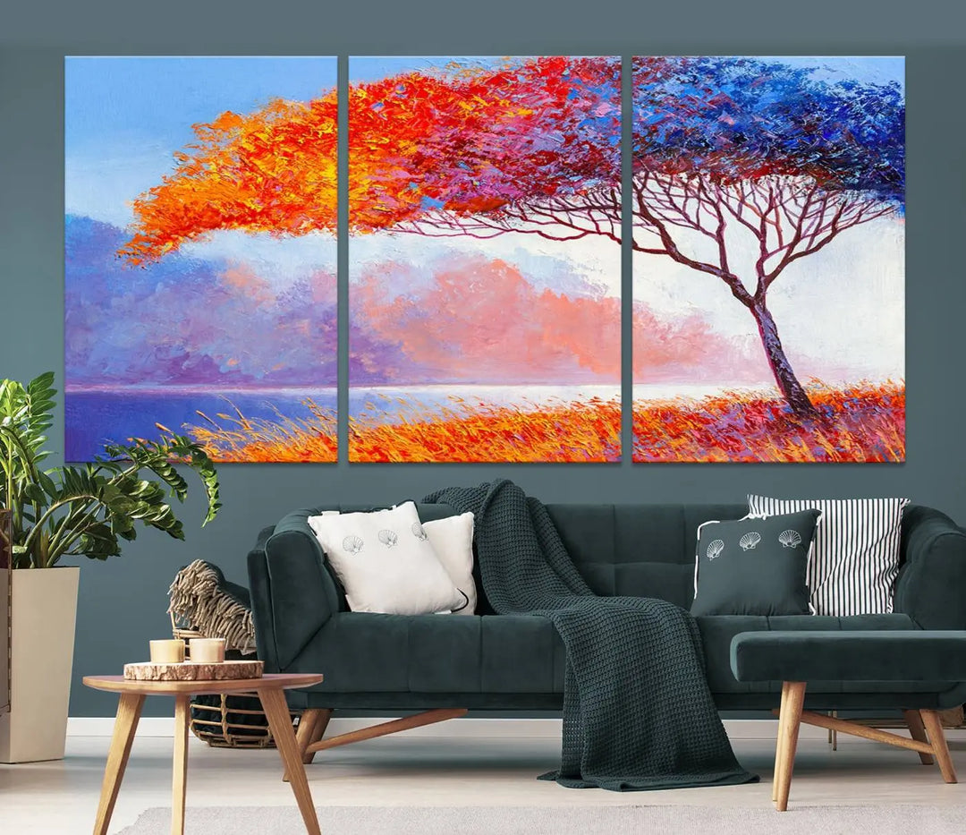 The Colorful Tree Wall Art Canvas is a vibrant, multi-panel painting depicting a colorful tree by a lake. It is crafted on museum-quality canvas and comes ready to hang.