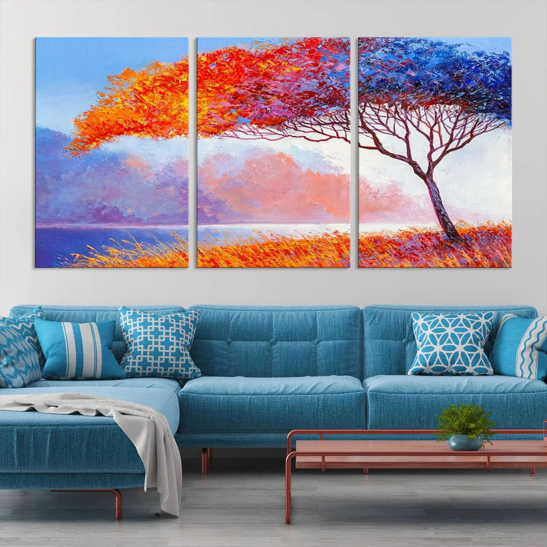 The Colorful Tree Wall Art Canvas is a vibrant, multi-panel painting depicting a colorful tree by a lake. It is crafted on museum-quality canvas and comes ready to hang.