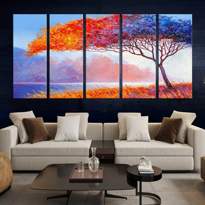 The Colorful Tree Wall Art Canvas is a vibrant, multi-panel painting depicting a colorful tree by a lake. It is crafted on museum-quality canvas and comes ready to hang.