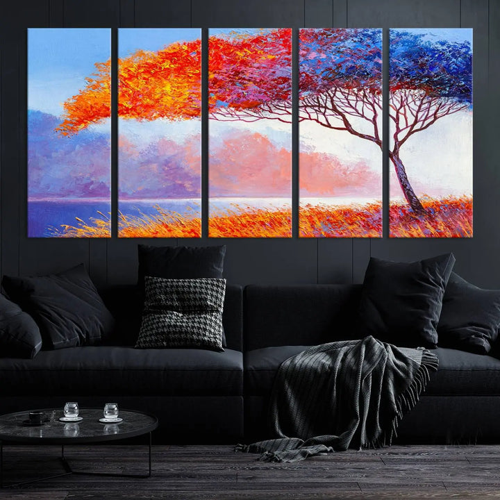 The Colorful Tree Wall Art Canvas is a vibrant, multi-panel painting depicting a colorful tree by a lake. It is crafted on museum-quality canvas and comes ready to hang.