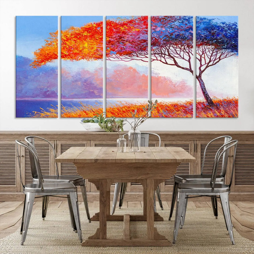 The Colorful Tree Wall Art Canvas is a vibrant, multi-panel painting depicting a colorful tree by a lake. It is crafted on museum-quality canvas and comes ready to hang.