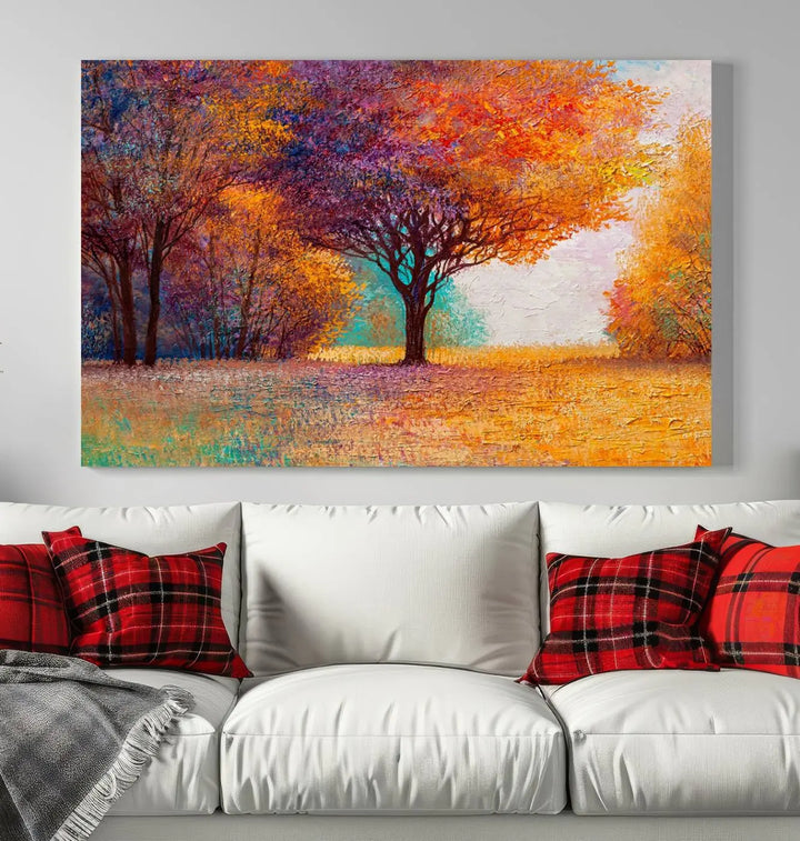 The "Colorful Tree in Autumn" wall art canvas print features a three-panel depiction of a vibrant autumn landscape, gallery wrapped on museum-quality polycotton with UV-protective coating, enhancing the wall in a stylish living room.