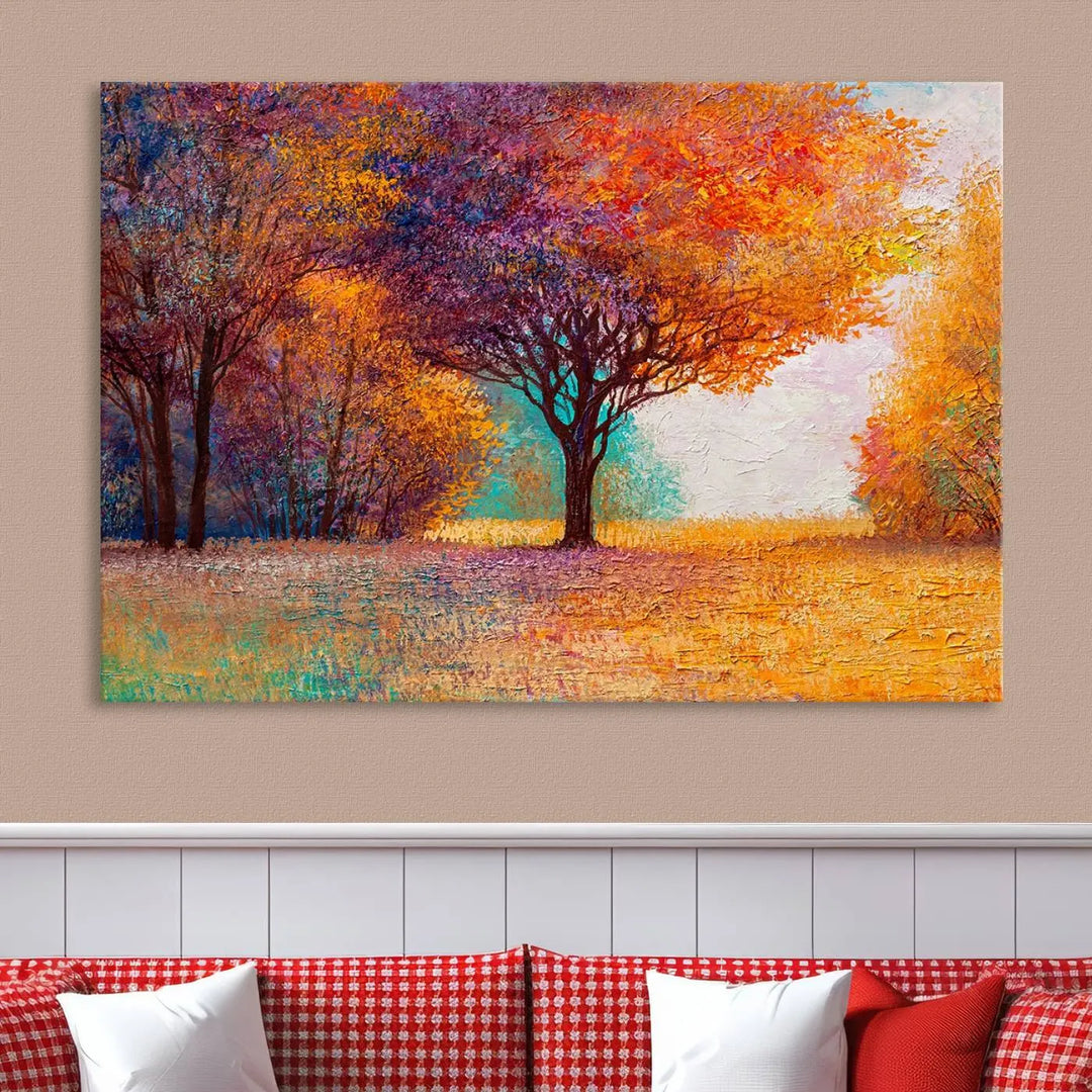 The "Colorful Tree in Autumn" wall art canvas print features a three-panel depiction of a vibrant autumn landscape, gallery wrapped on museum-quality polycotton with UV-protective coating, enhancing the wall in a stylish living room.