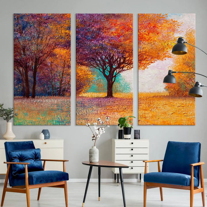 The "Colorful Tree in Autumn" wall art canvas print features a three-panel depiction of a vibrant autumn landscape, gallery wrapped on museum-quality polycotton with UV-protective coating, enhancing the wall in a stylish living room.