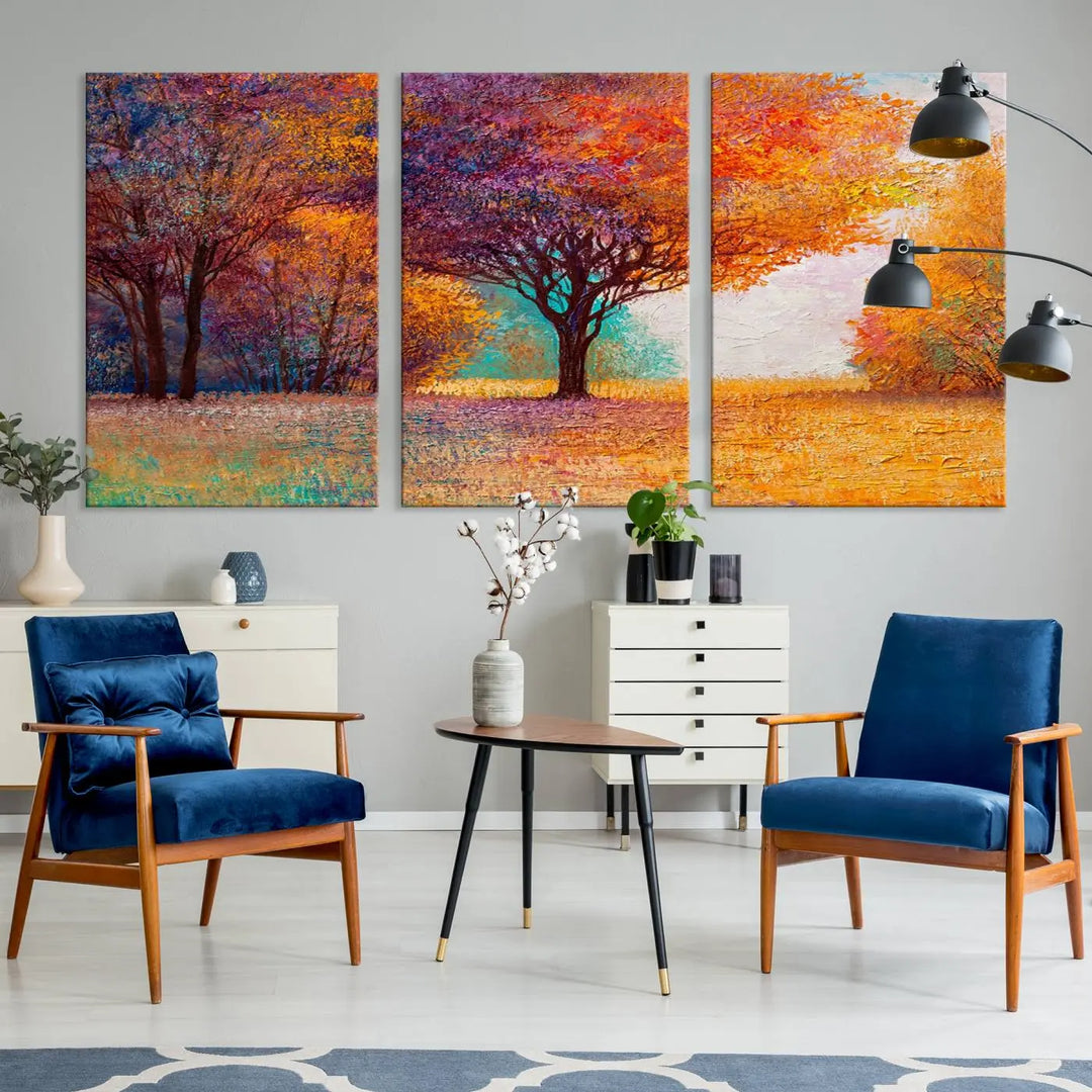 The "Colorful Tree in Autumn" wall art canvas print features a three-panel depiction of a vibrant autumn landscape, gallery wrapped on museum-quality polycotton with UV-protective coating, enhancing the wall in a stylish living room.