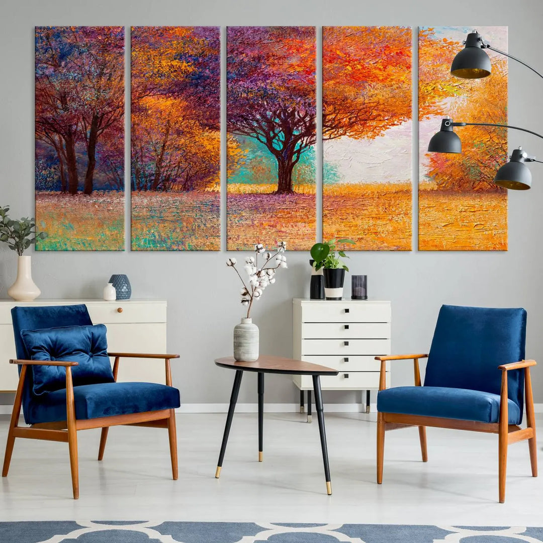 The "Colorful Tree in Autumn" wall art canvas print features a three-panel depiction of a vibrant autumn landscape, gallery wrapped on museum-quality polycotton with UV-protective coating, enhancing the wall in a stylish living room.