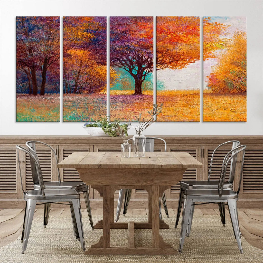 The "Colorful Tree in Autumn" wall art canvas print features a three-panel depiction of a vibrant autumn landscape, gallery wrapped on museum-quality polycotton with UV-protective coating, enhancing the wall in a stylish living room.