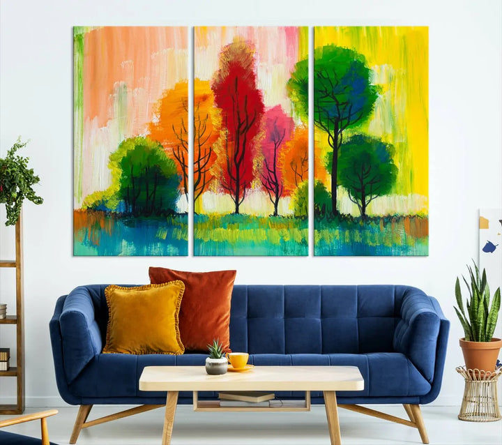 A modern living room features the "Colorful Trees Wall Art Canvas Print" on museum-quality canvases.