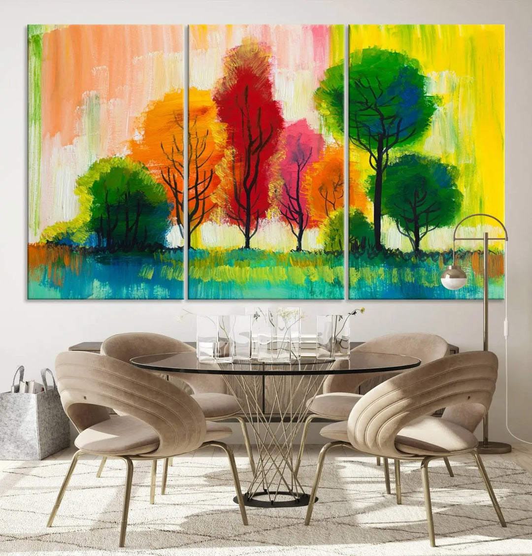 A modern living room features the "Colorful Trees Wall Art Canvas Print" on museum-quality canvases.