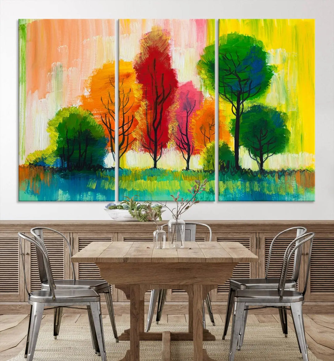 A modern living room features the "Colorful Trees Wall Art Canvas Print" on museum-quality canvases.