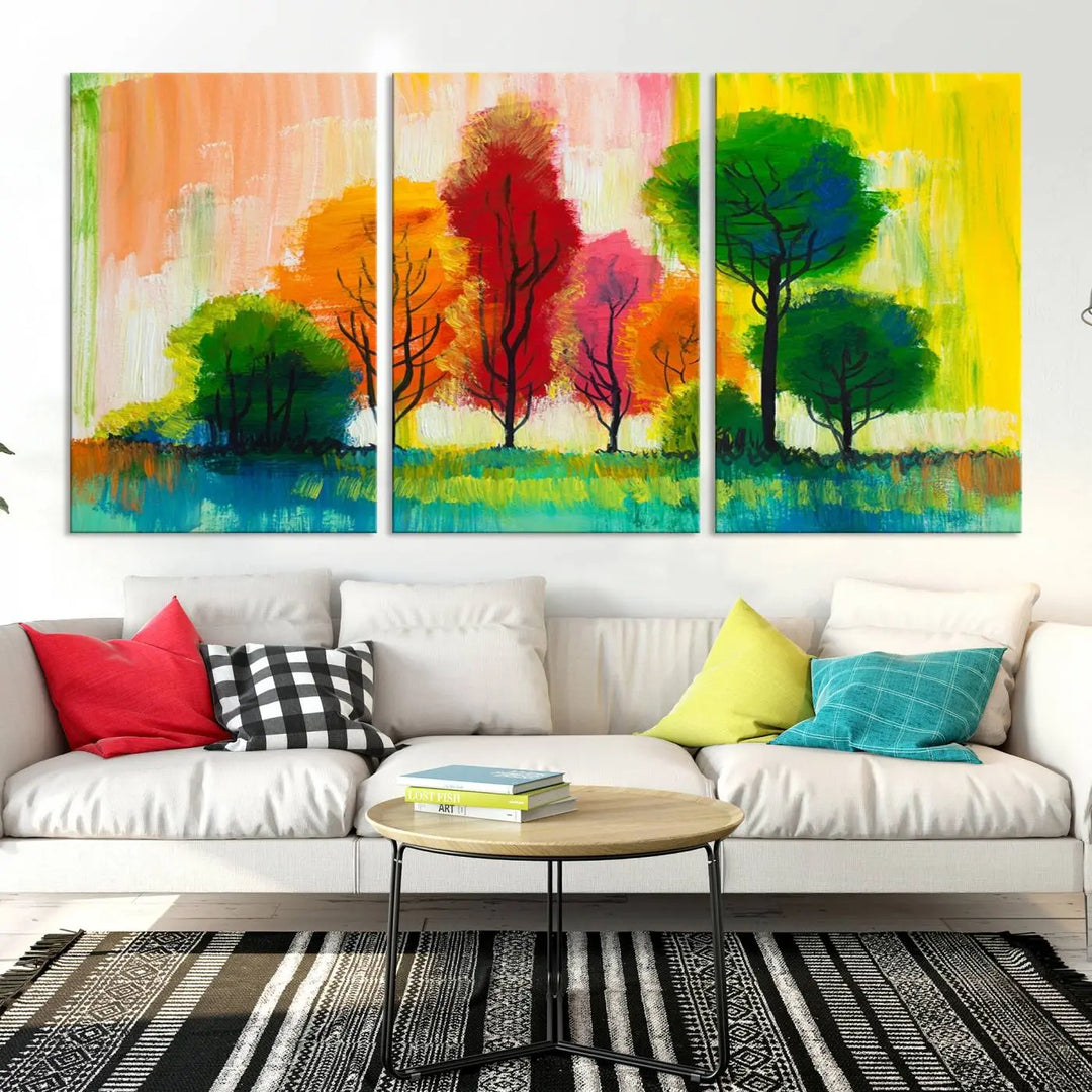 A modern living room features the "Colorful Trees Wall Art Canvas Print" on museum-quality canvases.