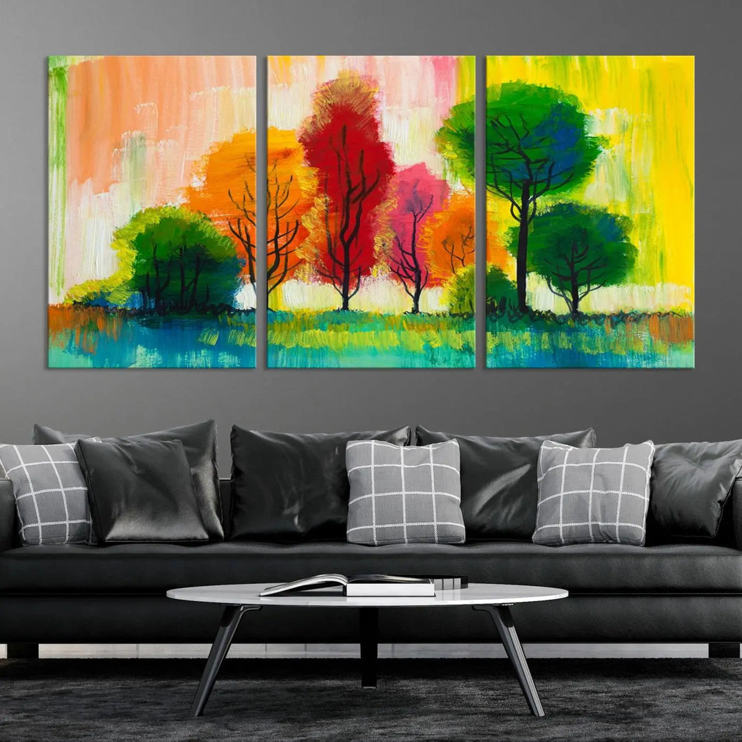 A modern living room features the "Colorful Trees Wall Art Canvas Print" on museum-quality canvases.