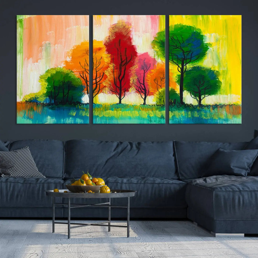 A modern living room features the "Colorful Trees Wall Art Canvas Print" on museum-quality canvases.