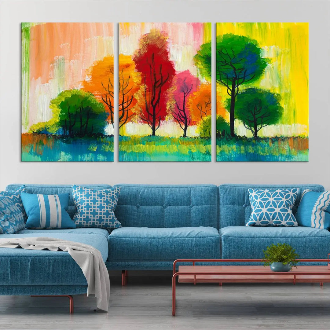 A modern living room features the "Colorful Trees Wall Art Canvas Print" on museum-quality canvases.