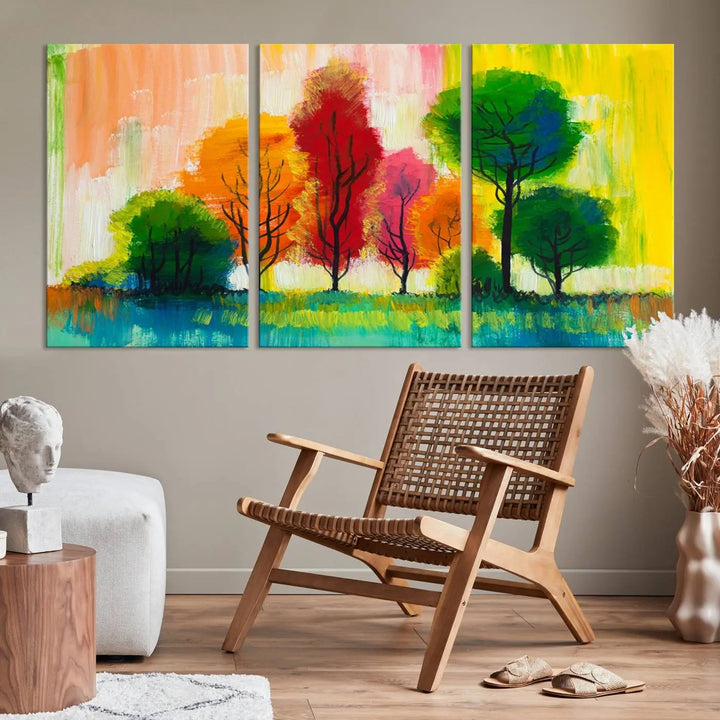 A modern living room features the "Colorful Trees Wall Art Canvas Print" on museum-quality canvases.