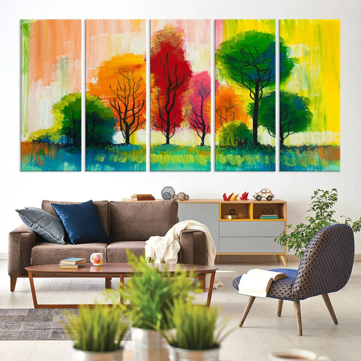 A modern living room features the "Colorful Trees Wall Art Canvas Print" on museum-quality canvases.