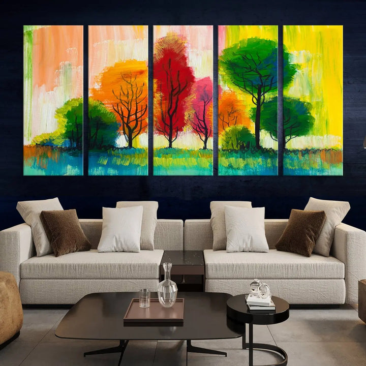 A modern living room features the "Colorful Trees Wall Art Canvas Print" on museum-quality canvases.