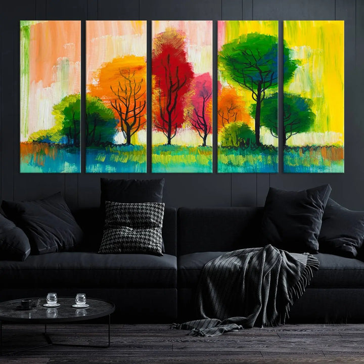 A modern living room features the "Colorful Trees Wall Art Canvas Print" on museum-quality canvases.