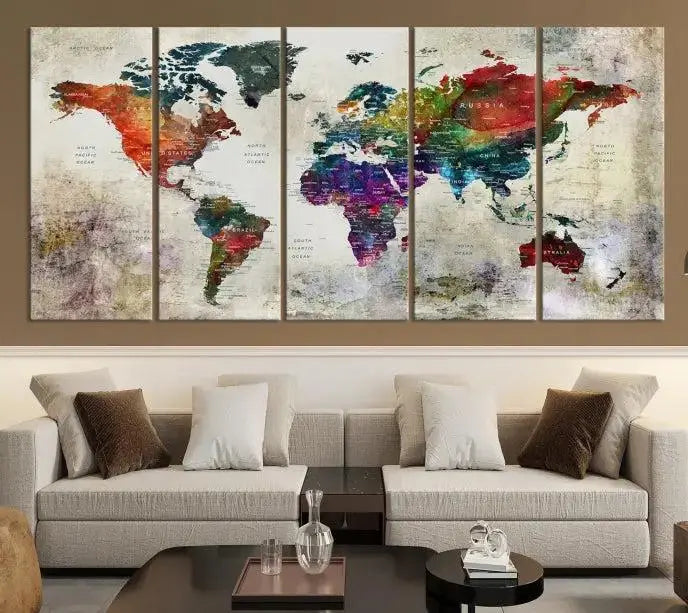 Colorful World Map Wall Art – Multicolored triptych decor hangs prominently.
