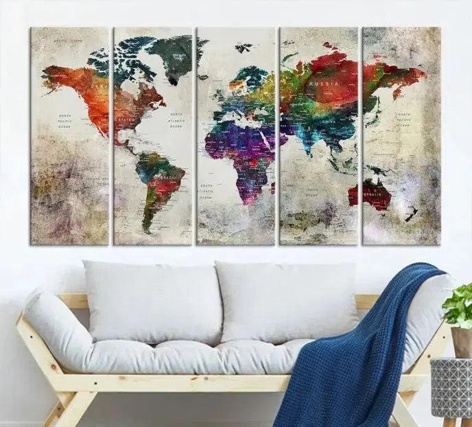 Colorful World Map Wall Art – Multicolored triptych decor hangs prominently.