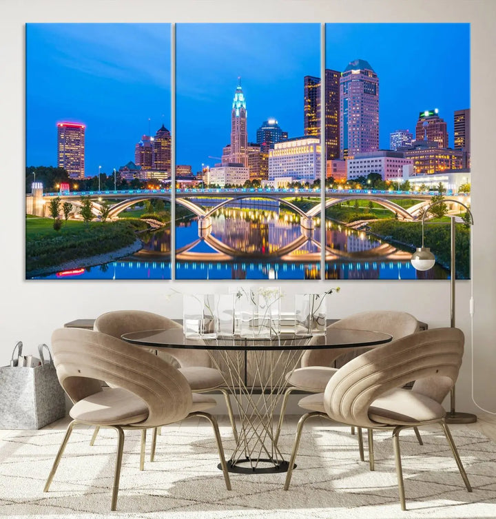 The modern living room is enhanced by the striking Columbus City Lights Bright Blue Skyline Cityscape View Wall Art Canvas Print displayed above white cabinets. This piece is crafted on museum-quality canvas with a UV-protective coating to ensure lasting beauty and vibrant colors.