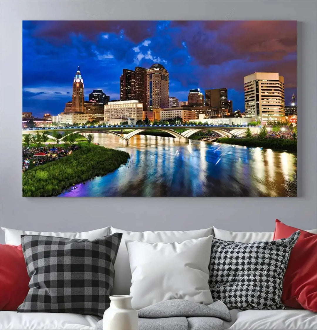 Columbus City Lights Night Bright Blue Cloudy Skyline Cityscape View Wall Art Canvas Print, gallery wrapped on museum-quality canvas, reflecting on a river.