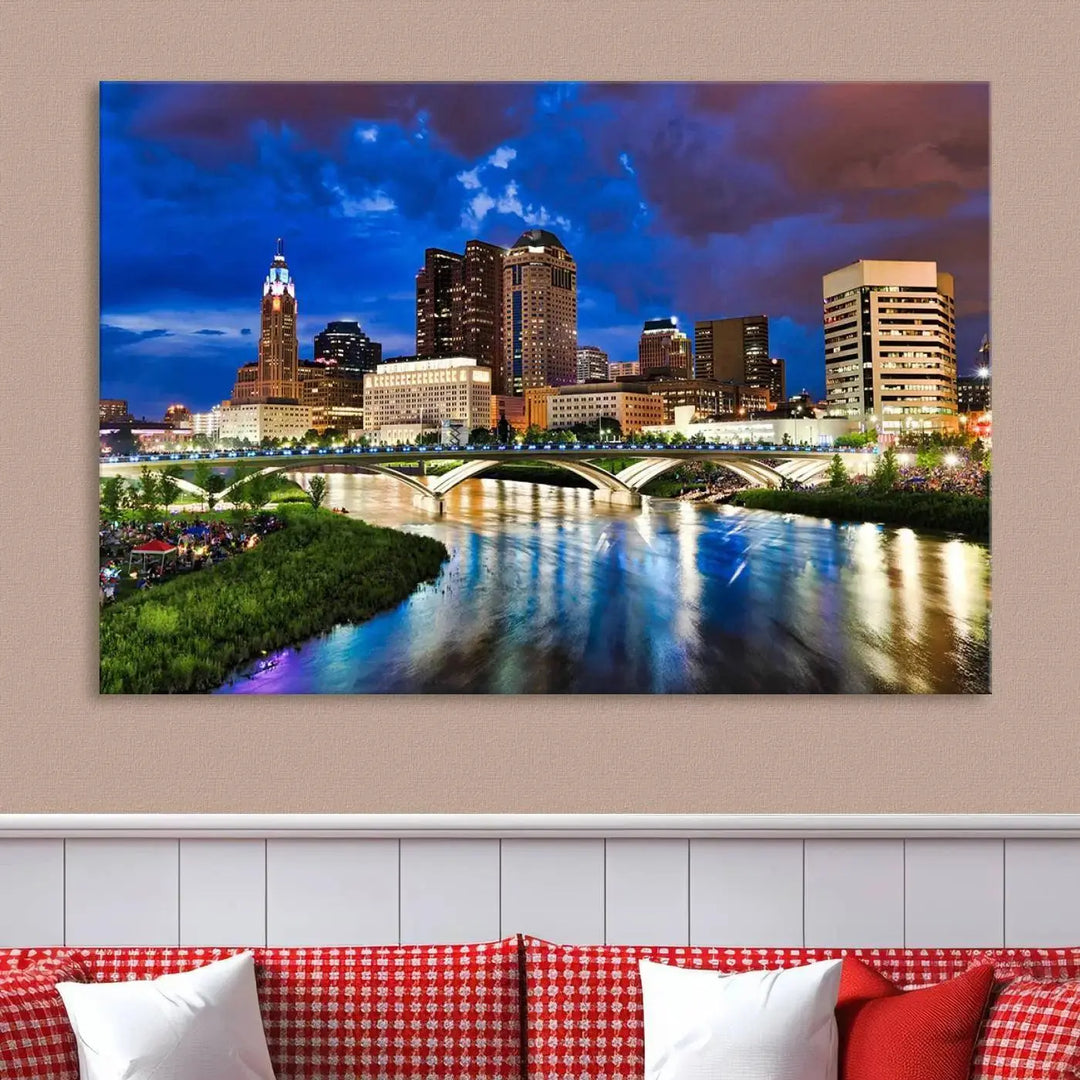 Columbus City Lights Night Bright Blue Cloudy Skyline Cityscape View Wall Art Canvas Print, gallery wrapped on museum-quality canvas, reflecting on a river.